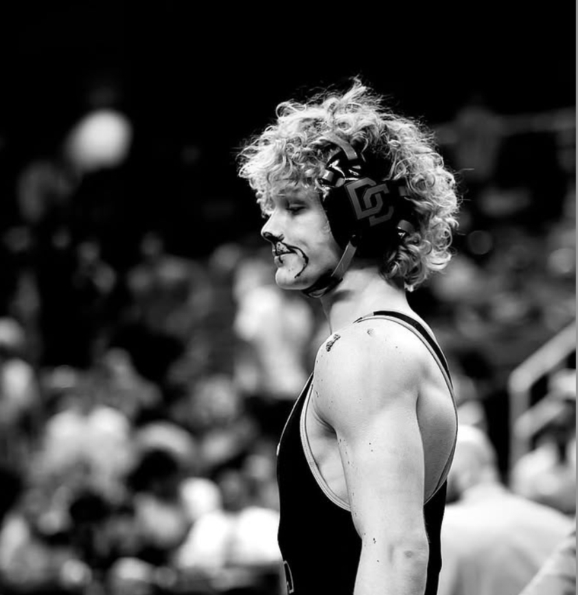 Wrestler in the arena—grit and choice